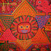 Mola con diseño de sol. Diseño y arte: mujeres del pueblo Guna de Panamá. X: @womensart1
